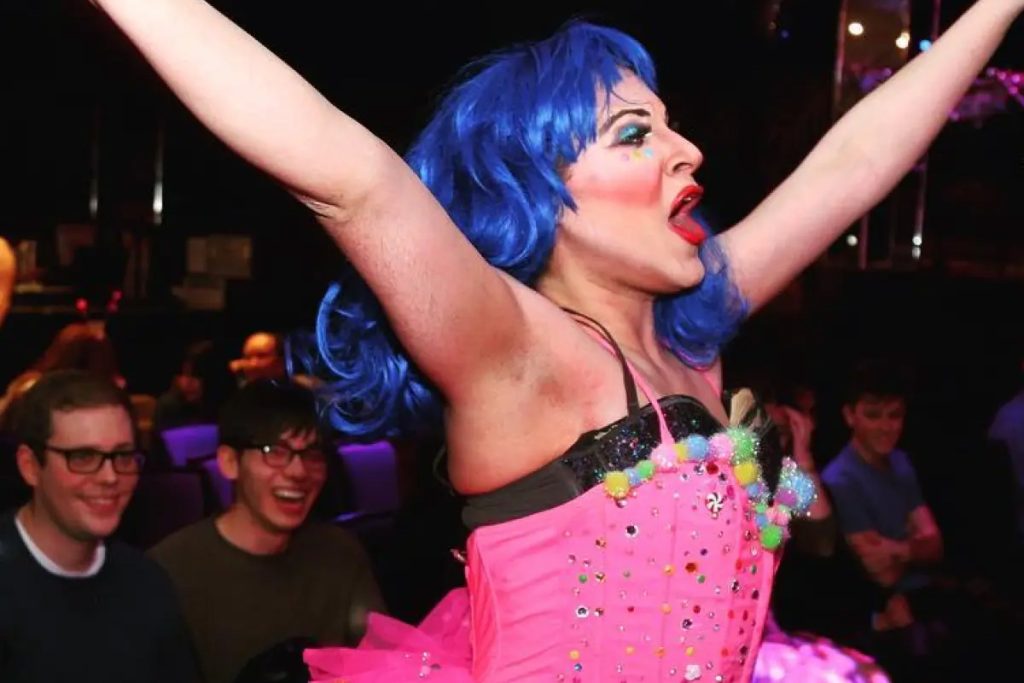 a group of people in a dark room